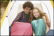 Adolescent couple in tent