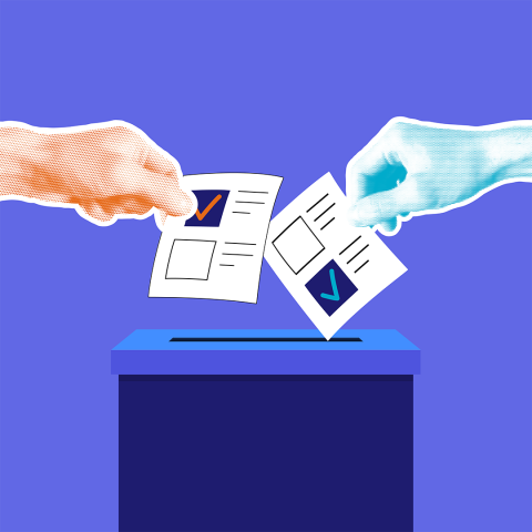 A picture of two hands placing ballots into a ballot box